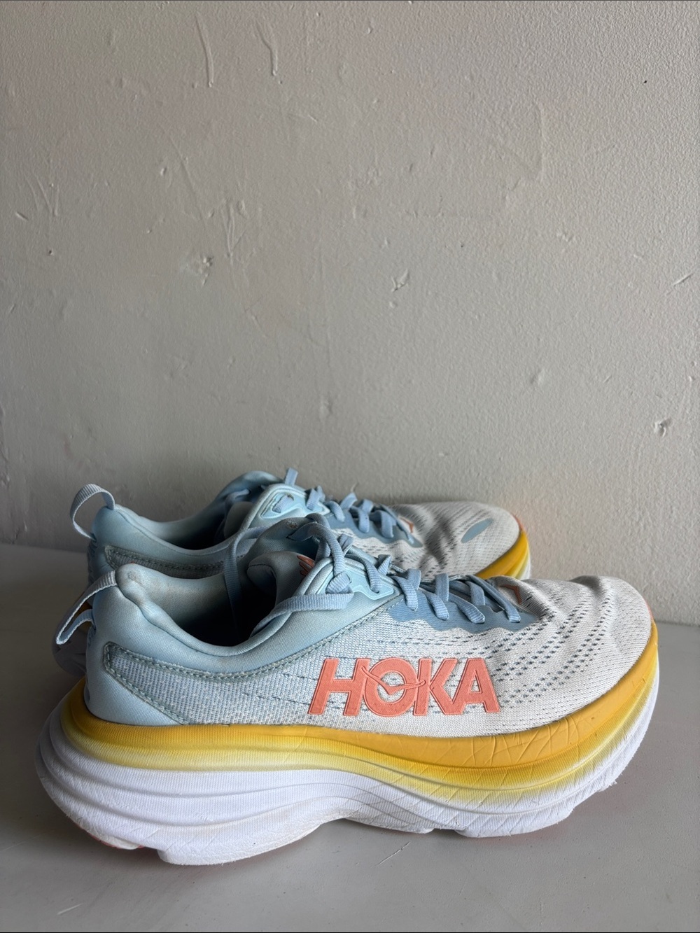 HOKA Bondi 8 Women's Light Blue and Yellow Running Shoes with Coral Logo